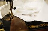 Sewing machine with white shirt