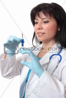 Female doctor preparing syringe