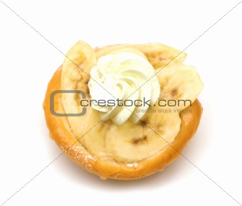 cake with bananas on white background