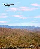 Airplane Over Desert