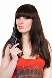 The young woman with a pistol. Isolated