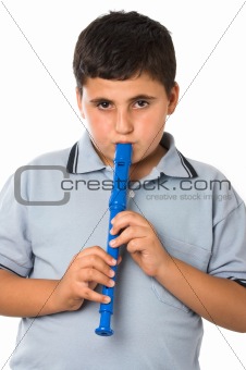 boy playing recorder