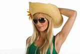 Beautiful blonde girl with summer hat and sunglasses