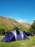 Family tent with mountainn backdrop