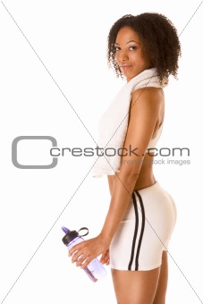 Fit female with bottle of water and towel