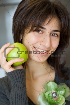 Portrait of girl with green apple