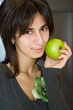 Portrait of girl with green apple