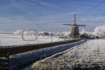 Dutch windmill in a winter landscape