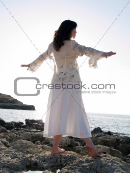 Young Lady Dancing on Sea Shore