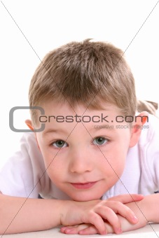 Cute handsome adorable young boy with chin on hands