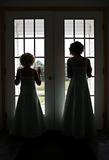 bridesmaids at window