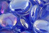 Blue glass beads macro texture background
