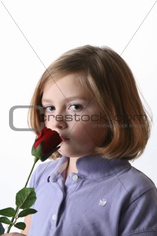 Pretty girl with red rose