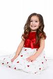 pretty toddler in red and white holiday dress
