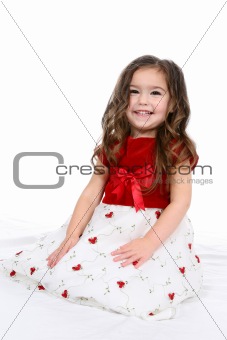 pretty toddler in red and white holiday dress