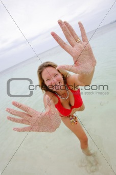 Woman with Sandy Hands