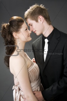 Portrait of a young beautiful couple embracing.