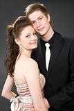 Portrait of a young beautiful couple embracing.