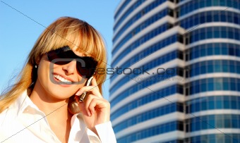 Beautiful young woman speaking the phone