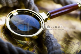 Map & Magnifying glass & Rope