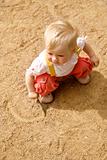 little girl on a sand 