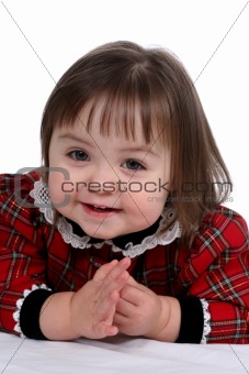 Cute little girl in red plaid dress