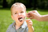 Kid Eating Yogurt