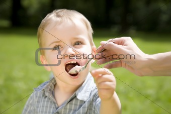 Kid Eating Yogurt