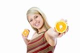 young happiness woman giving sliced orange.