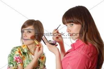 two pretty girls making up