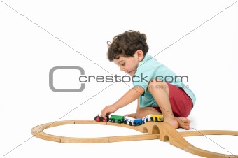 boy playing with train