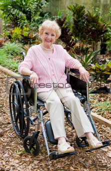 Senior Woman In Wheelchair Outdoors