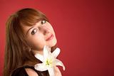 Beautiful girl with orchid, lot of copy-space
