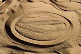 Cirlce in beach sand.