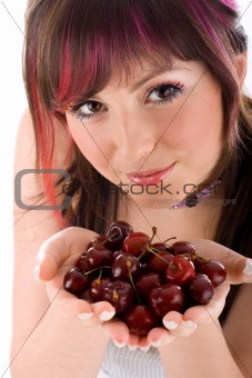 Portrait of seductive woman holding cherries