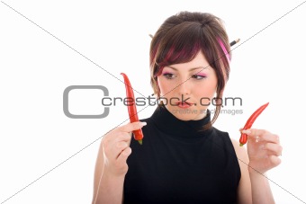 Sexy hot woman looking at chilli peppers