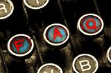 close up on typewriter faq keys