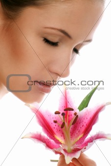beauty portrait of a woman with a flower