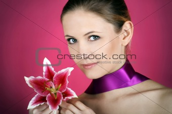 fashion and beauty portrait with a flower