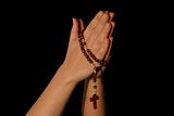 praying with a rosary