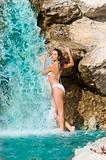 white bikini and waterfall