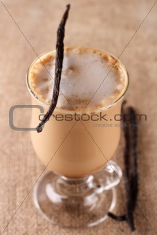 Coffee Vanilla Latte with bean on hessian background