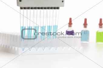 Scientist using pipette in research