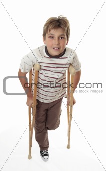 Injured child using crutches