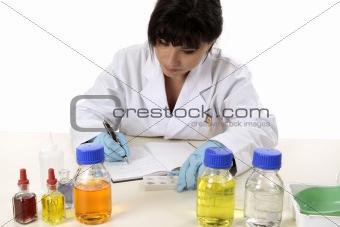 Scientist documenting results
