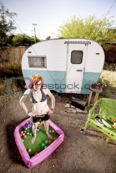 Woman outside a trailer