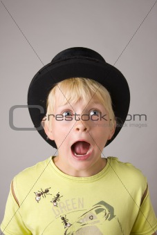Portrait of a young boy shouting