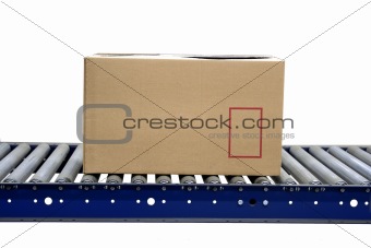 Isolated carton on conveyor rollers