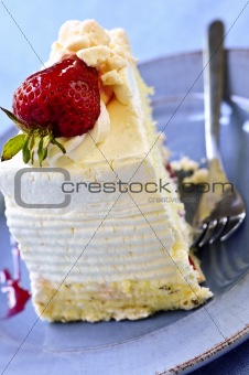 Slice of strawberry meringue cake