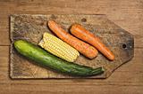 Carrots, corn and cucumber.